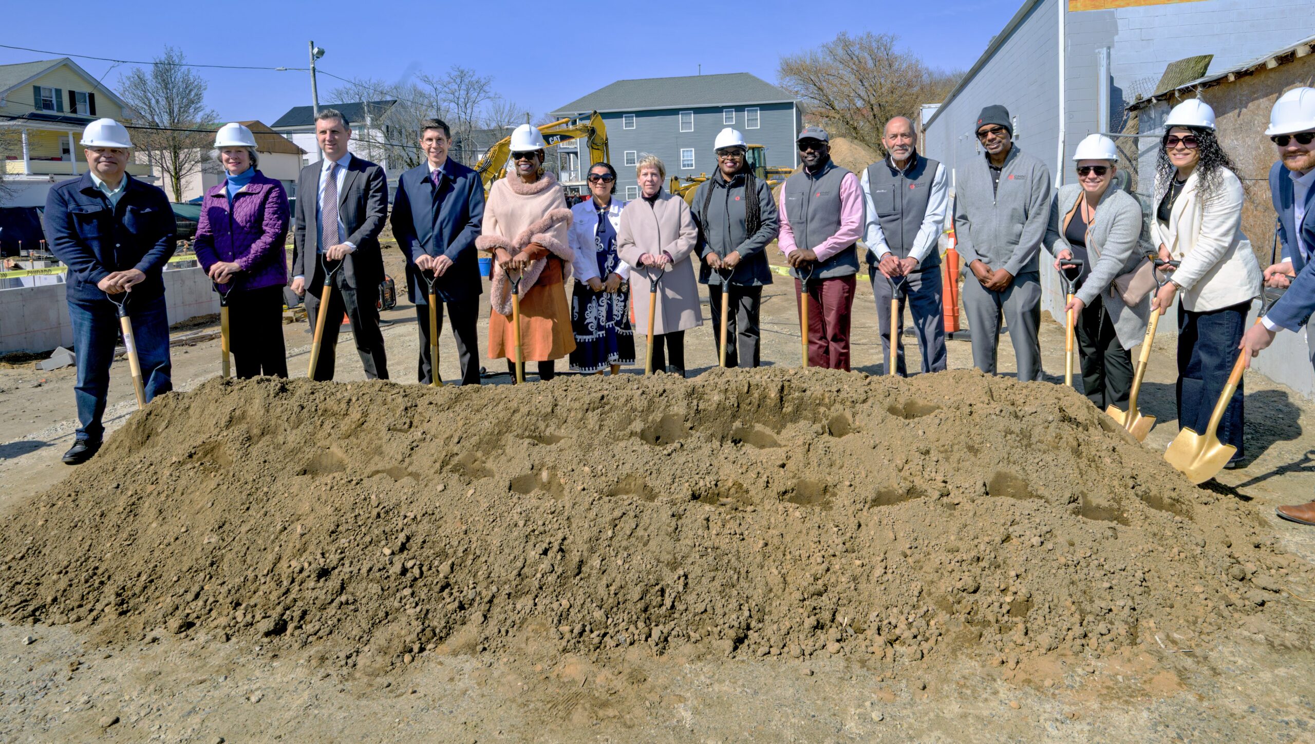 Elected and local officials, funders and community members join Omni Development Corporation to break ground on 52 new units of affordable housing in Providence